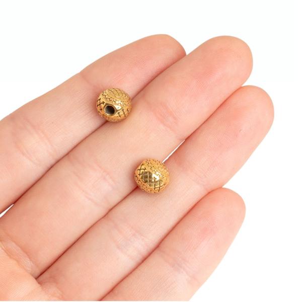 Gy�ngy 8 mm arany nemesac�l (ion plating)
