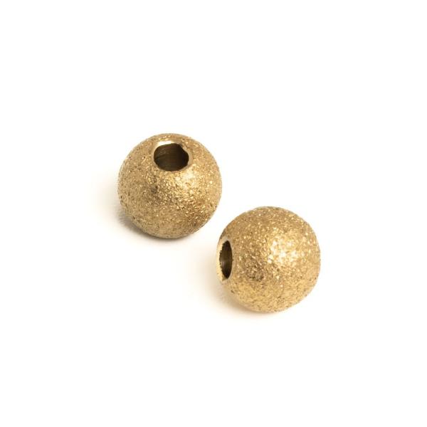 Homokf�vott hat�s� gy�ngy 6x5 mm arany nemesac�l 2 db (ion plating)