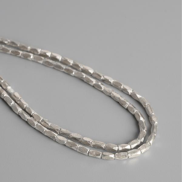 Minigy�ngy�k 1,4x2,5 mm Ag925 ez�st 10 db