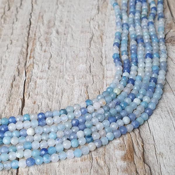 koralky-z-mineralu-opal-modry-3mm-brusene-fazetovane-leskle-modre-belase-biele-goralky--