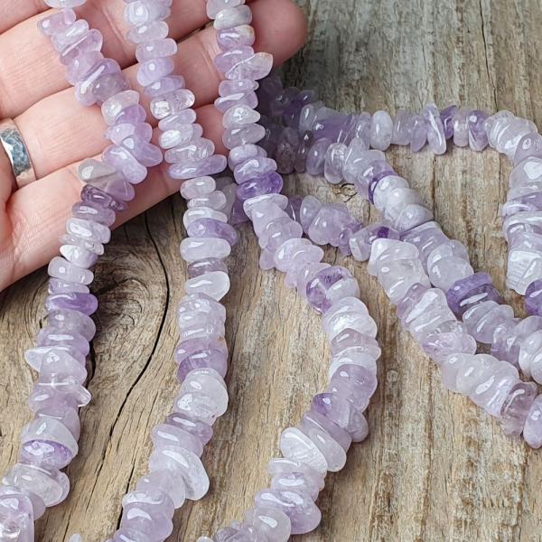 koralky-z-prirodneho-mineralu-ametyst-lavender-rondelky-nepravidelne-leskle-oble-fialove