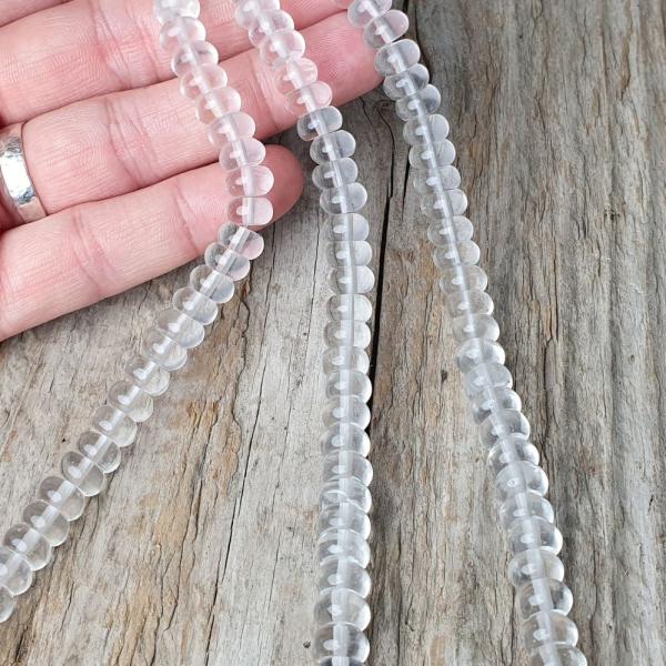 koralky-z-mineralu-kristal-rondelky-5x8mm-tucne-hrube-oble-leskle-cire-priesvitne-pravide