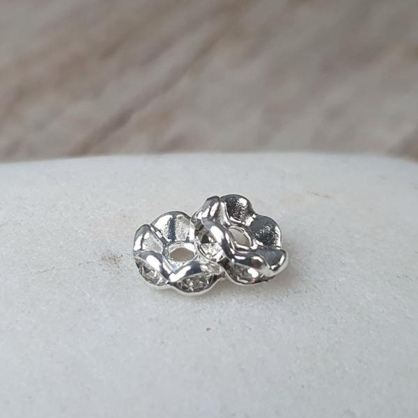 koralky-strasove-rondelky-strieborne-zvlnene-crystal-ab-leskle-vykladane-leskle-8mm-