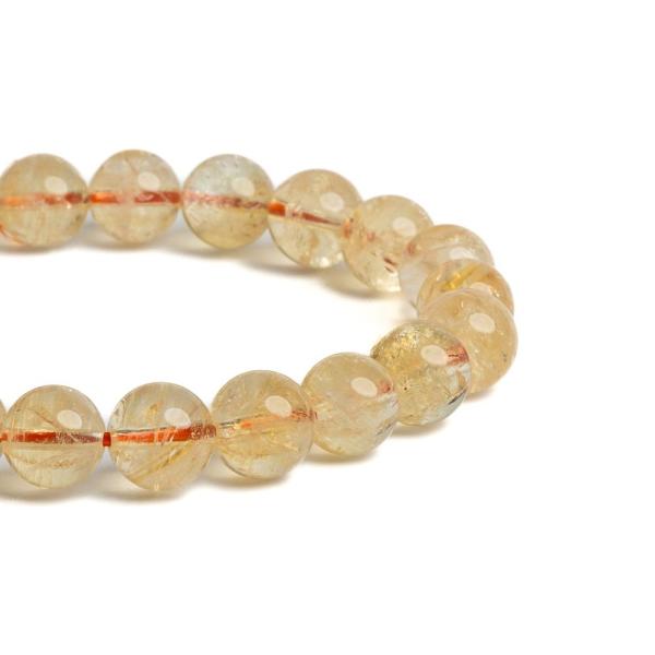 naramok-z-prirodneho-mineralu-kristal-so-zlatym-rutilom-8mm-leskly-elasticky-zlty